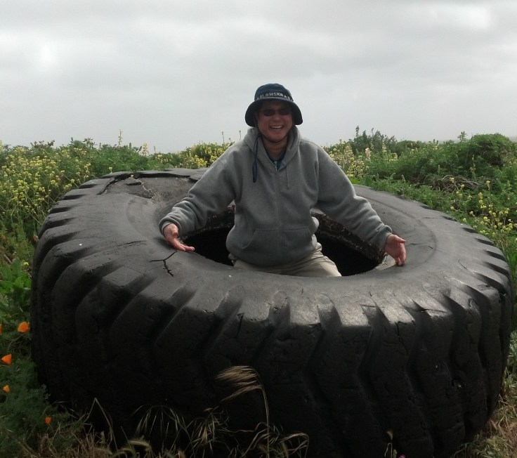 Dad in the big ass tire (cropped)