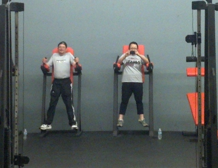 My dad got free guest pass last year, and I decided to workout with him. It's a little frightening how much we look like each other in this photo.